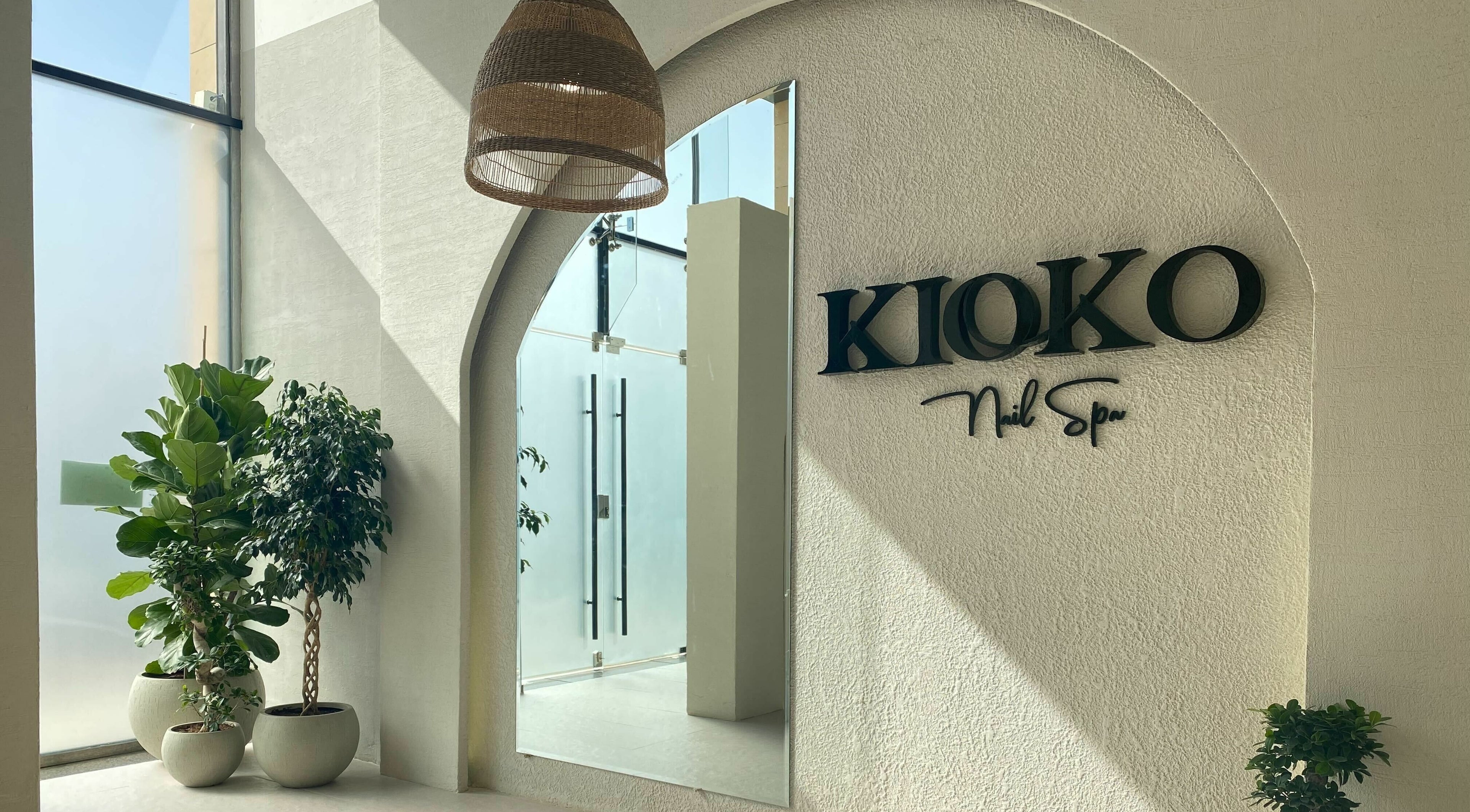 Entrance of Kioko Nail Spa in Riyadh, Riyadh Province, SA featuring soothing plants and elegant decor.