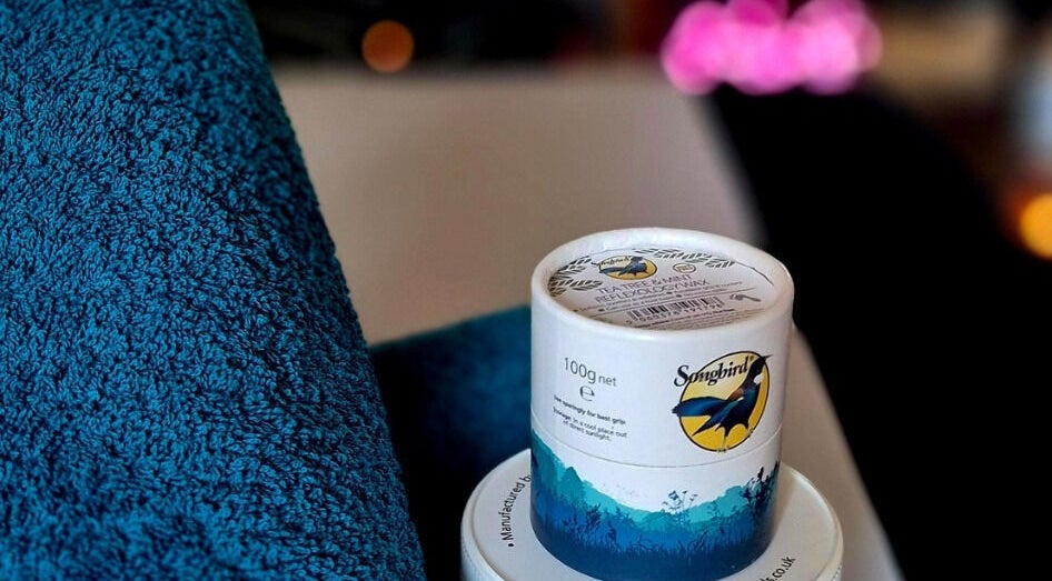 Blue towel and balm at Sports and Deep Tissue Massage, Colchester, England, GB fostering relaxation.