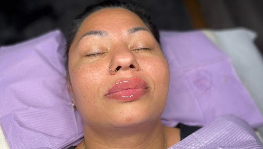 Client enjoying a facial treatment at Beauty Innovation, Colchester, England, GB.