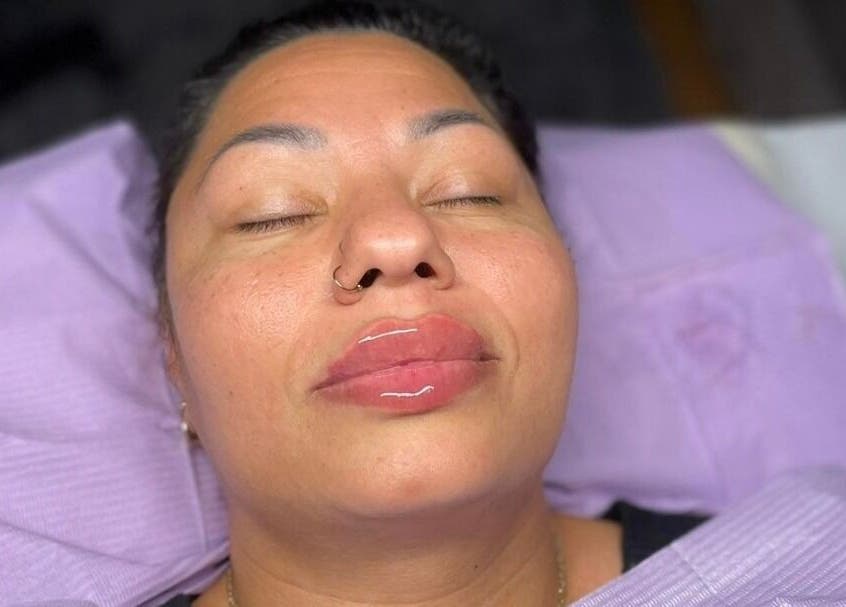 Client enjoying a facial treatment at Beauty Innovation, Colchester, England, GB.