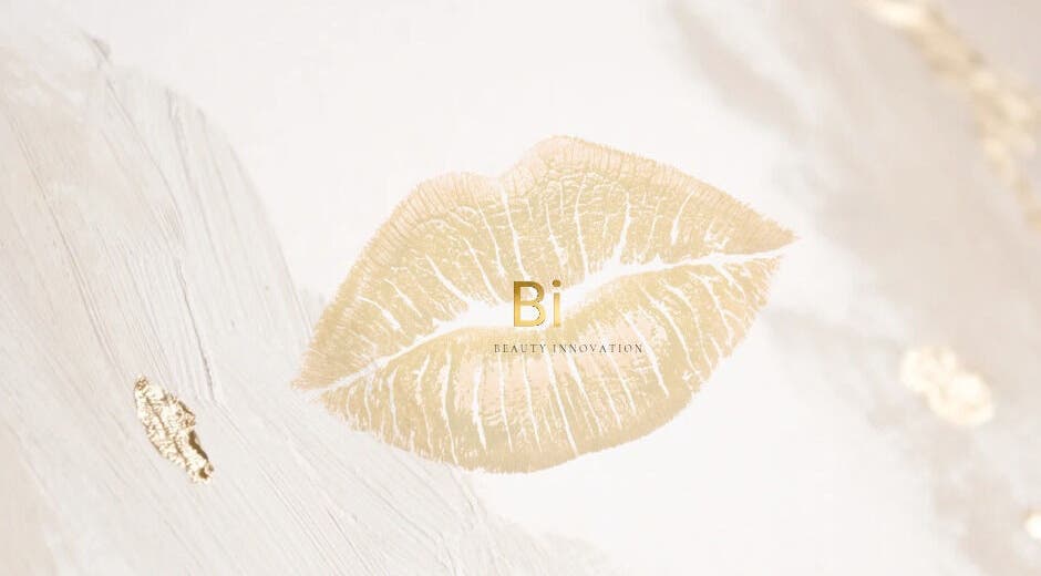 Elegant golden lip print design at Beauty Innovation, Colchester, England, GB.
