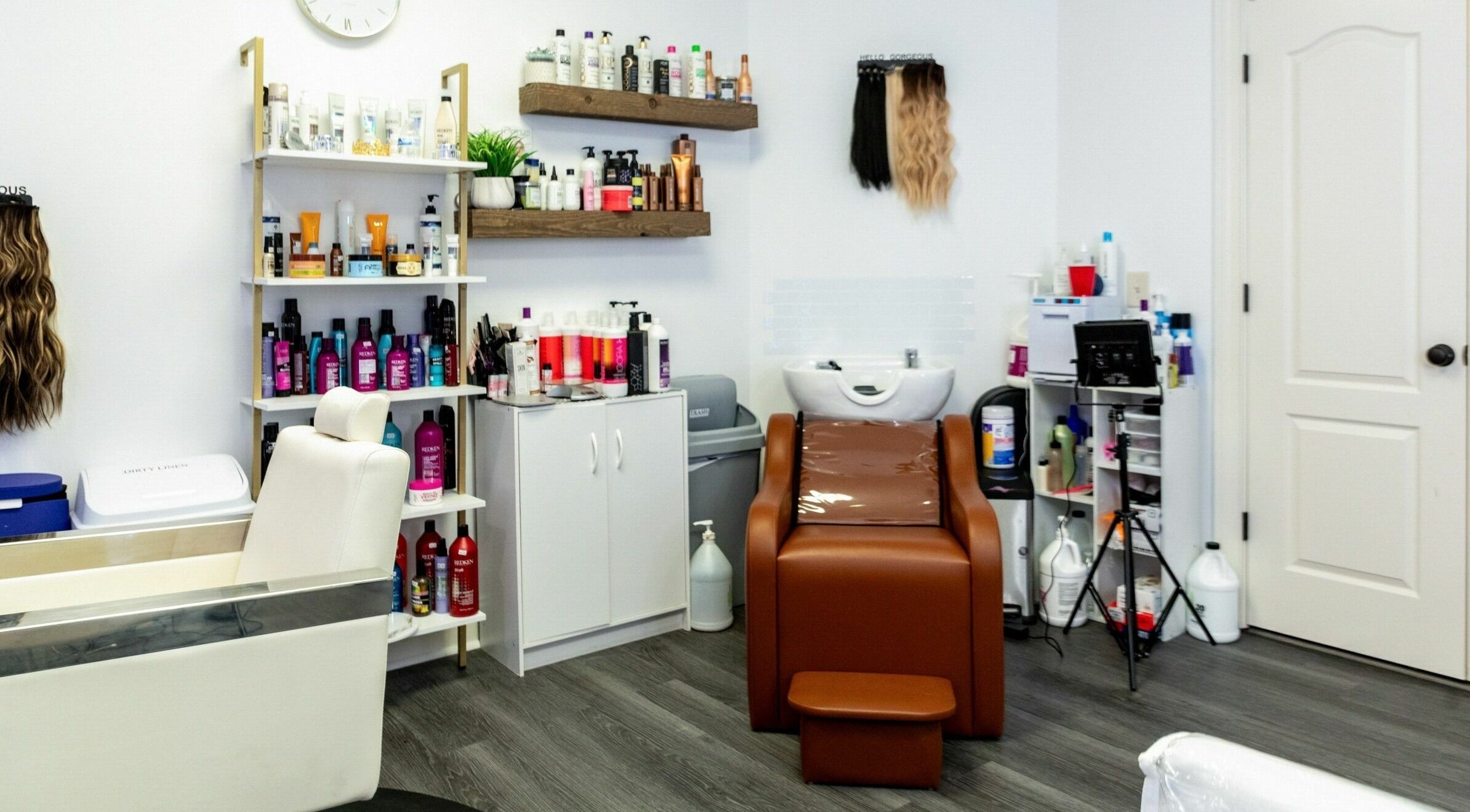 Modern hair salon setup at Viva Beauty Bar Via Maks Salon, Cumming, Georgia, US showcasing various hair products.