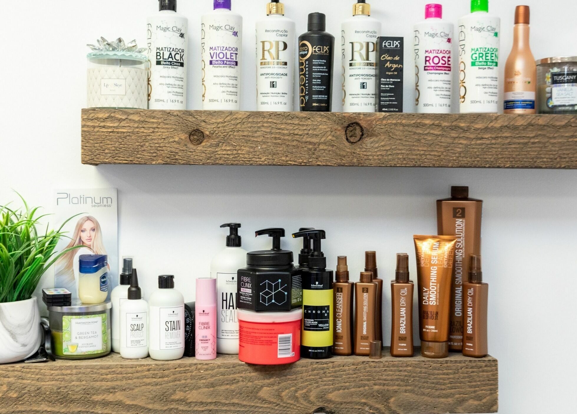 Product-packed shelves at Viva Beauty Bar Via Maks Salon in Cumming, Georgia, US showcase diverse hair care items.