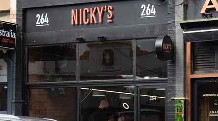 Exterior of Nicky's barbershop near The Conductor Richmond in Richmond, VIC, AU showcasing modern signage.