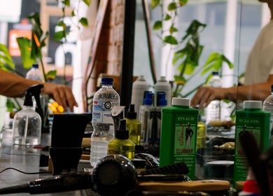 Grooming tools and products on a counter at The Conductor Richmond, Richmond, VIC, AU.