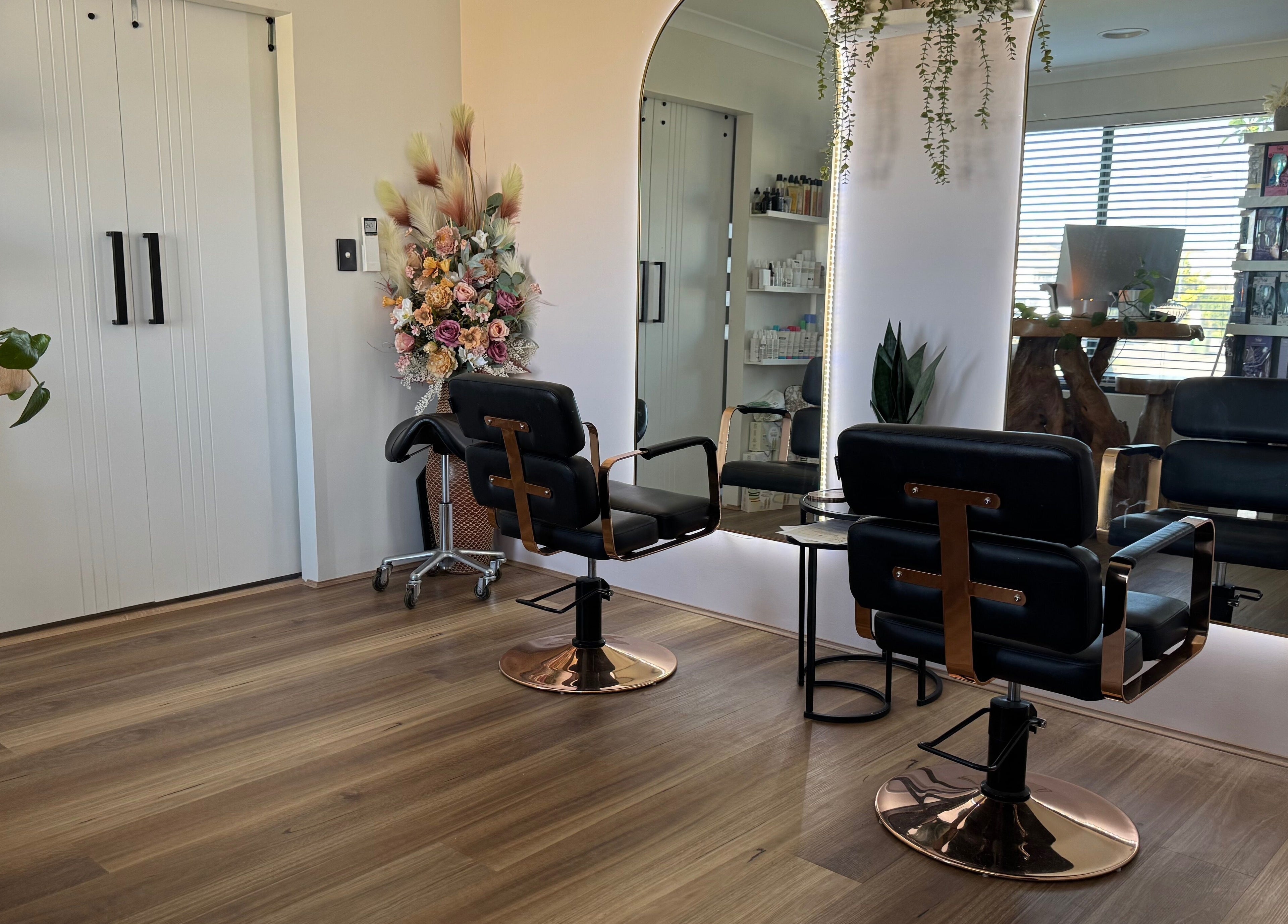 Modern salon chairs and floral decor at Exclusive Look/ Hair by Natasha Thomas, Wanneroo, Western Australia, AU.