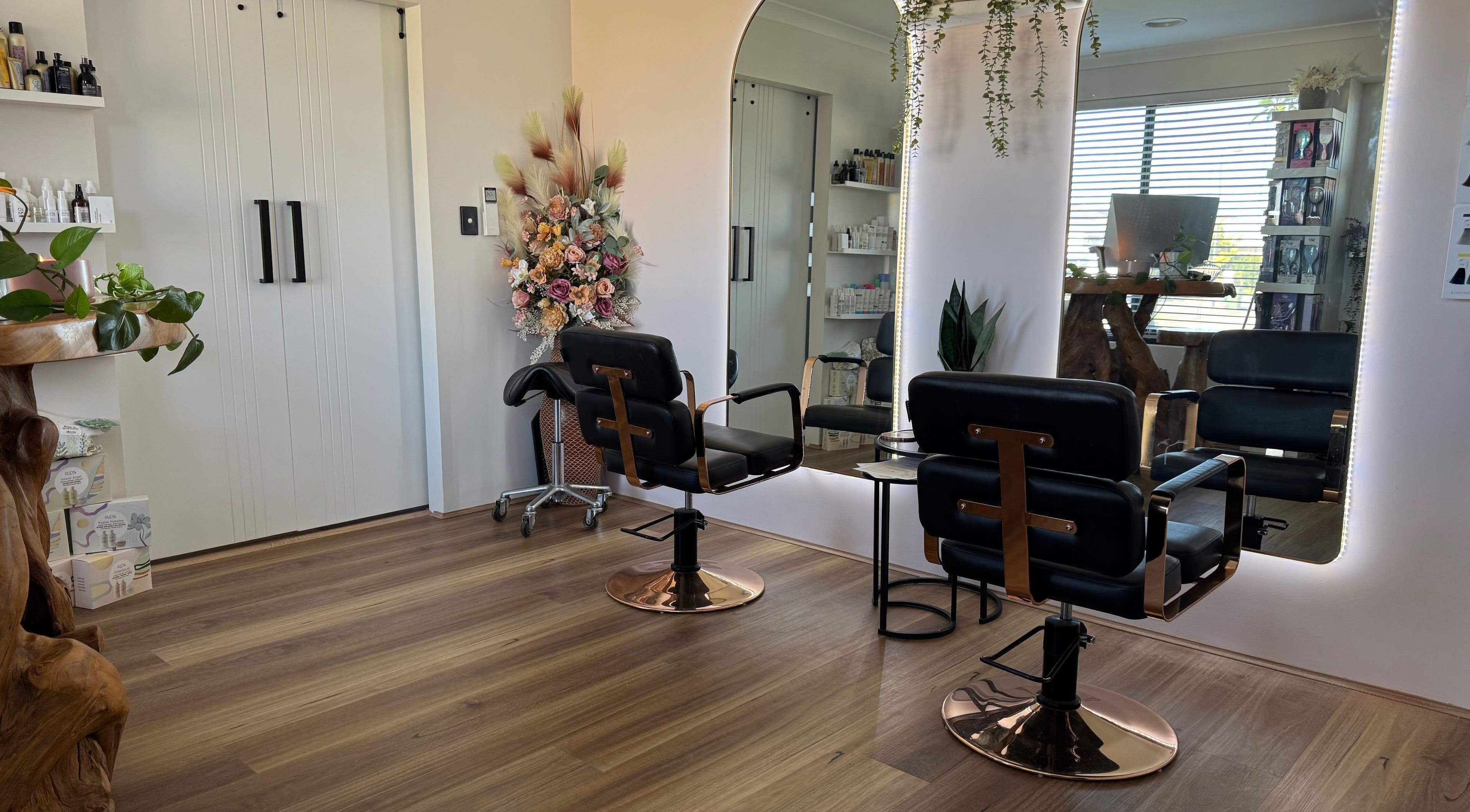 Modern salon chairs and floral decor at Exclusive Look/ Hair by Natasha Thomas, Wanneroo, Western Australia, AU.