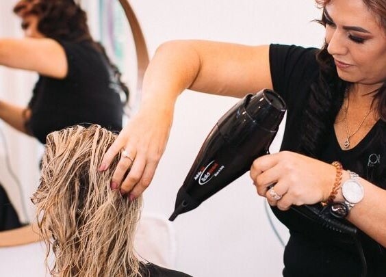 Professional blow-dry session at Exclusive Look by Natasha Thomas in Wanneroo, Western Australia, AU.