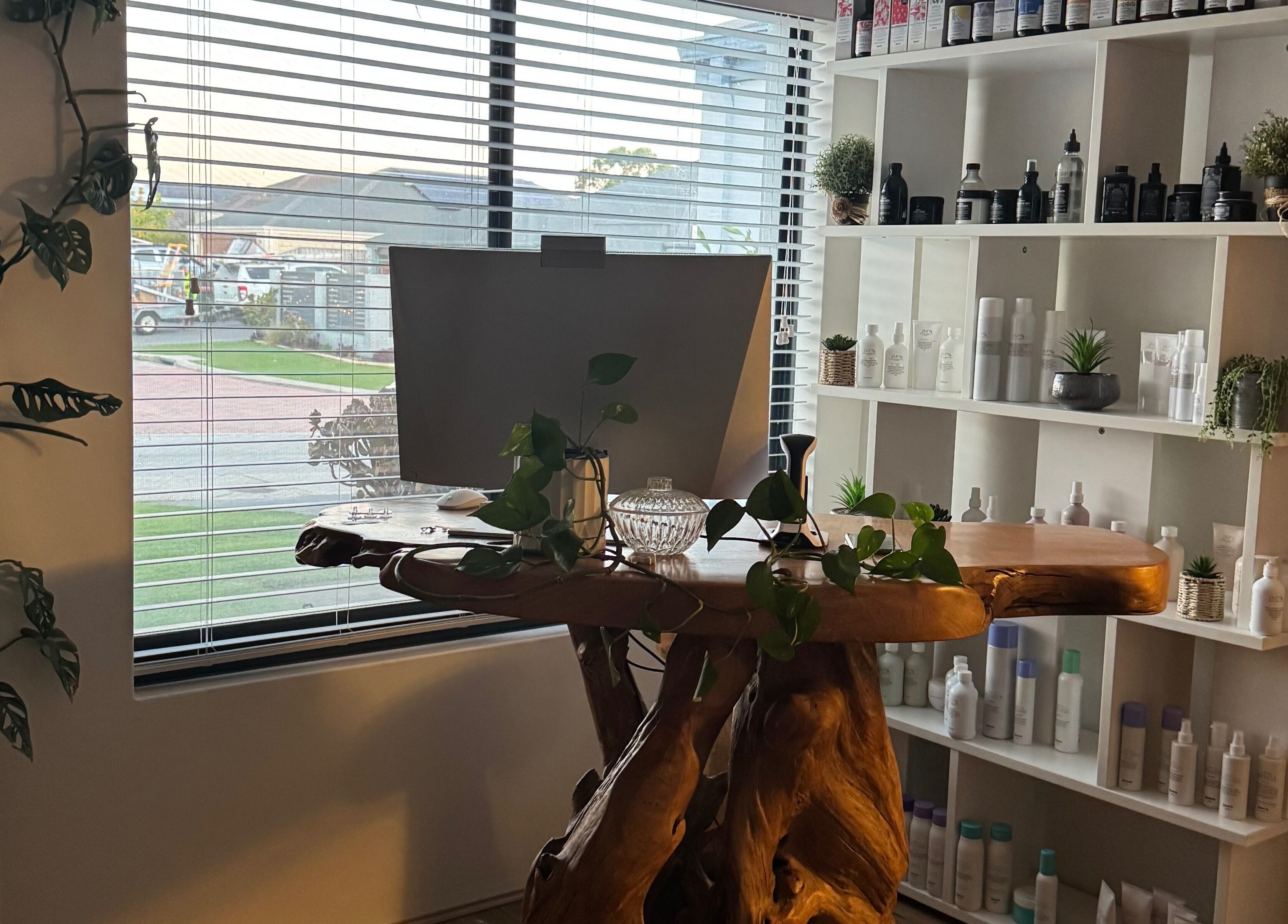Cozy salon interior with wooden table at Exclusive Look/ Hair by Natasha Thomas, Wanneroo, Western Australia, AU.