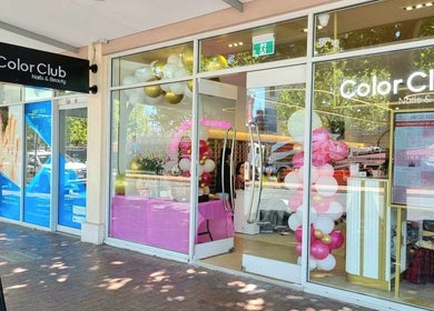 Color Club Nails & Beauty - North Adelaide storefront with festive balloons, located in North Adelaide, South Australia, AU.