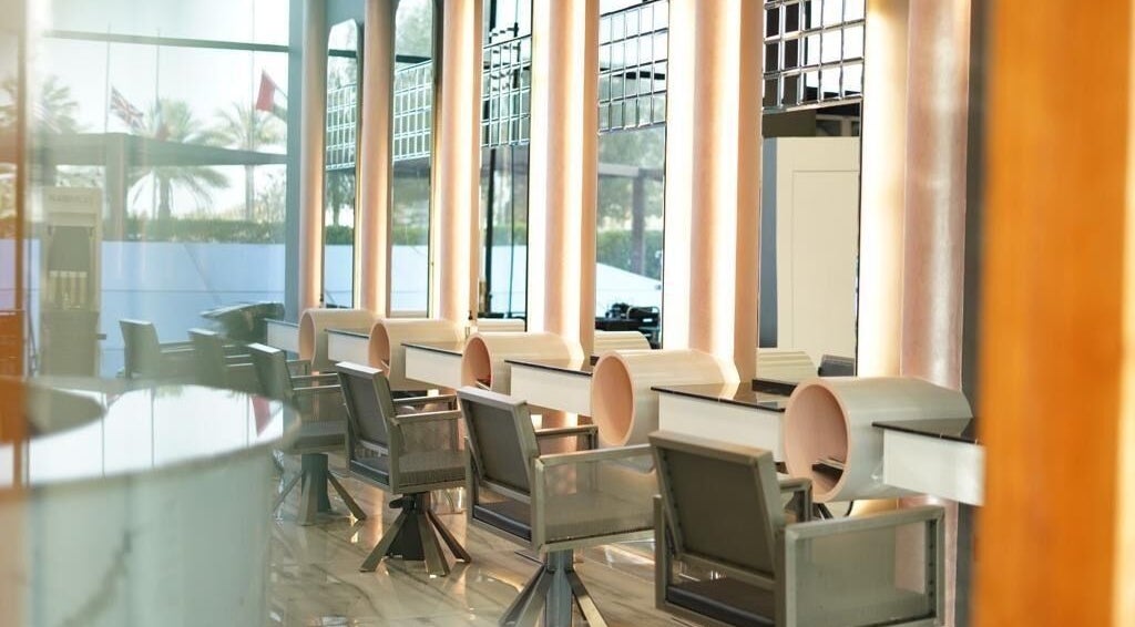 Stylish salon chairs at Blowdry Ladies & Gents Salon in Abu Dhabi, AE, offering a serene beauty experience.