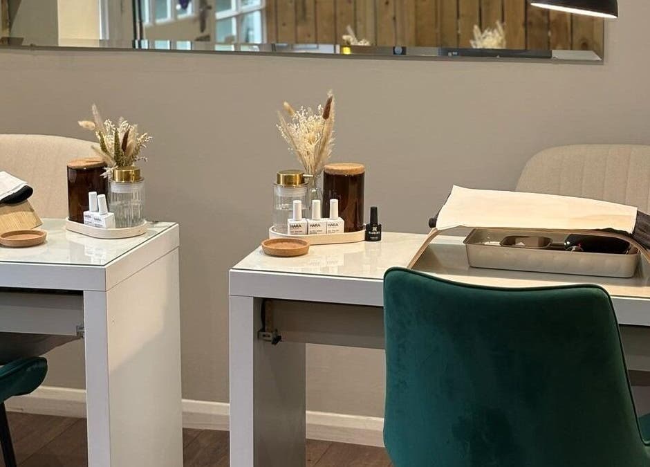 Modern nail treatment stations at Harringtons Devizes in Devizes, GB, showcasing sleek design and decor.