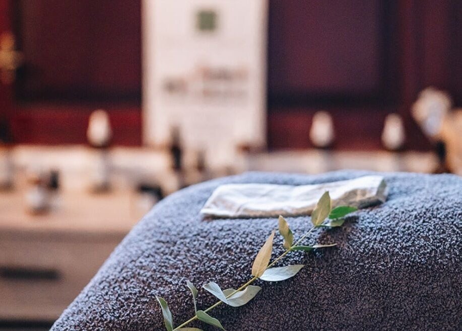 A plush towel with leaves at The Wellness Lounge with Oils in Bloom, East Lothian, Scotland, GB.