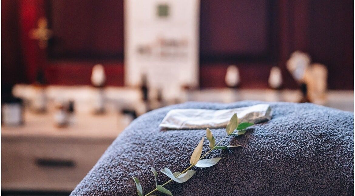 A plush towel with leaves at The Wellness Lounge with Oils in Bloom, East Lothian, Scotland, GB.