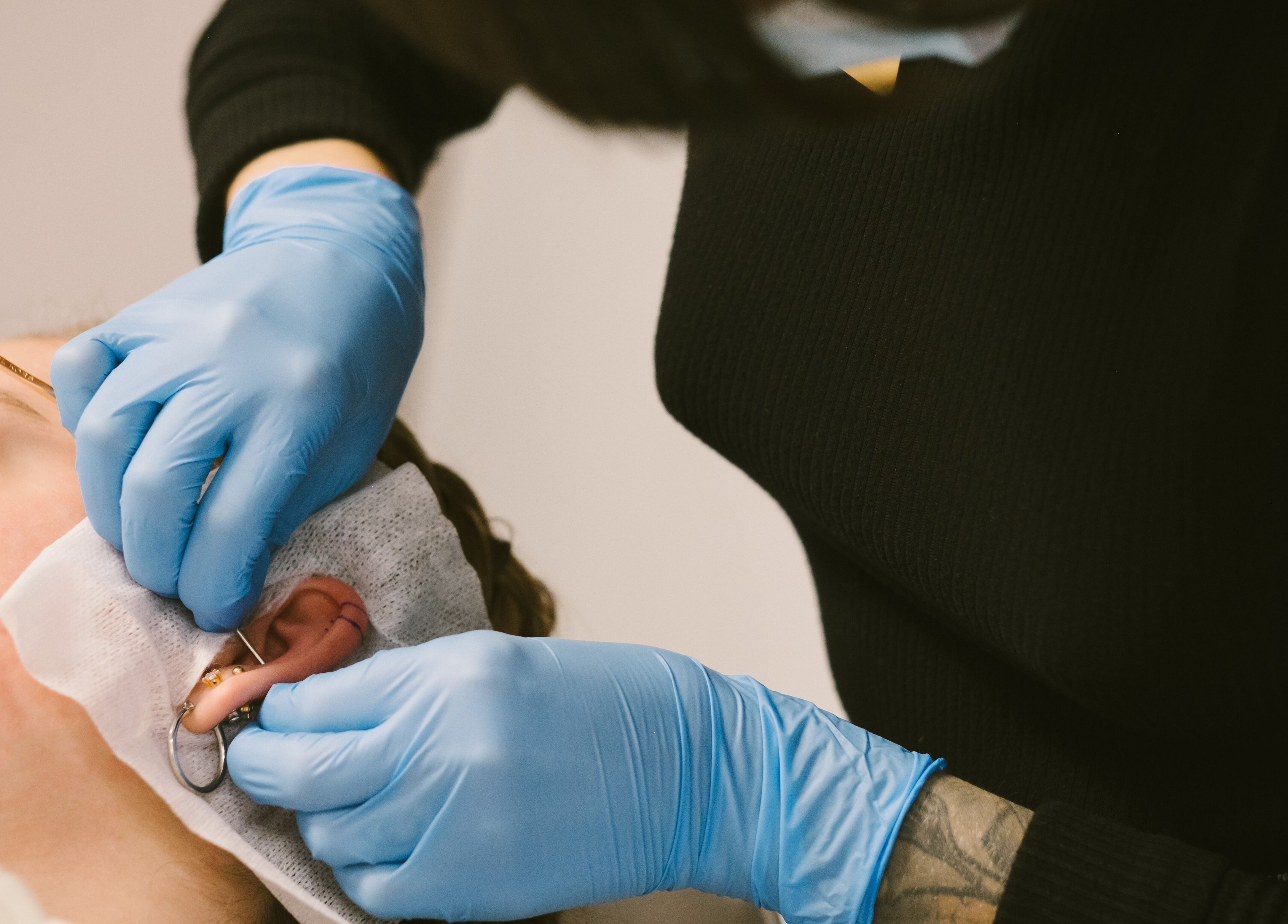 Professional ear piercing at Relic Piercing And Tattoo in Ottawa, Ontario, CA by a skilled artist.