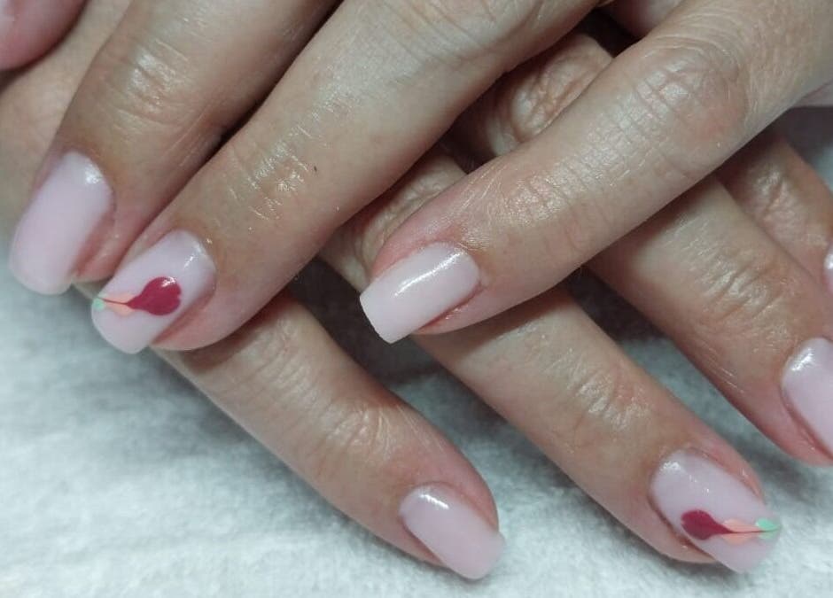 Elegant blush manicure at Nails by Karen, Cape Town, Western Cape, ZA featuring subtle nail art.
