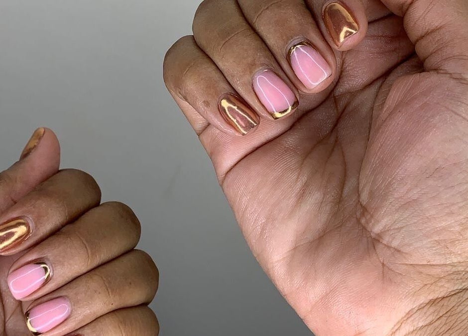 Metallic nail art at GelJunkiess & Co., Portmore, JM enhances elegant manicures.