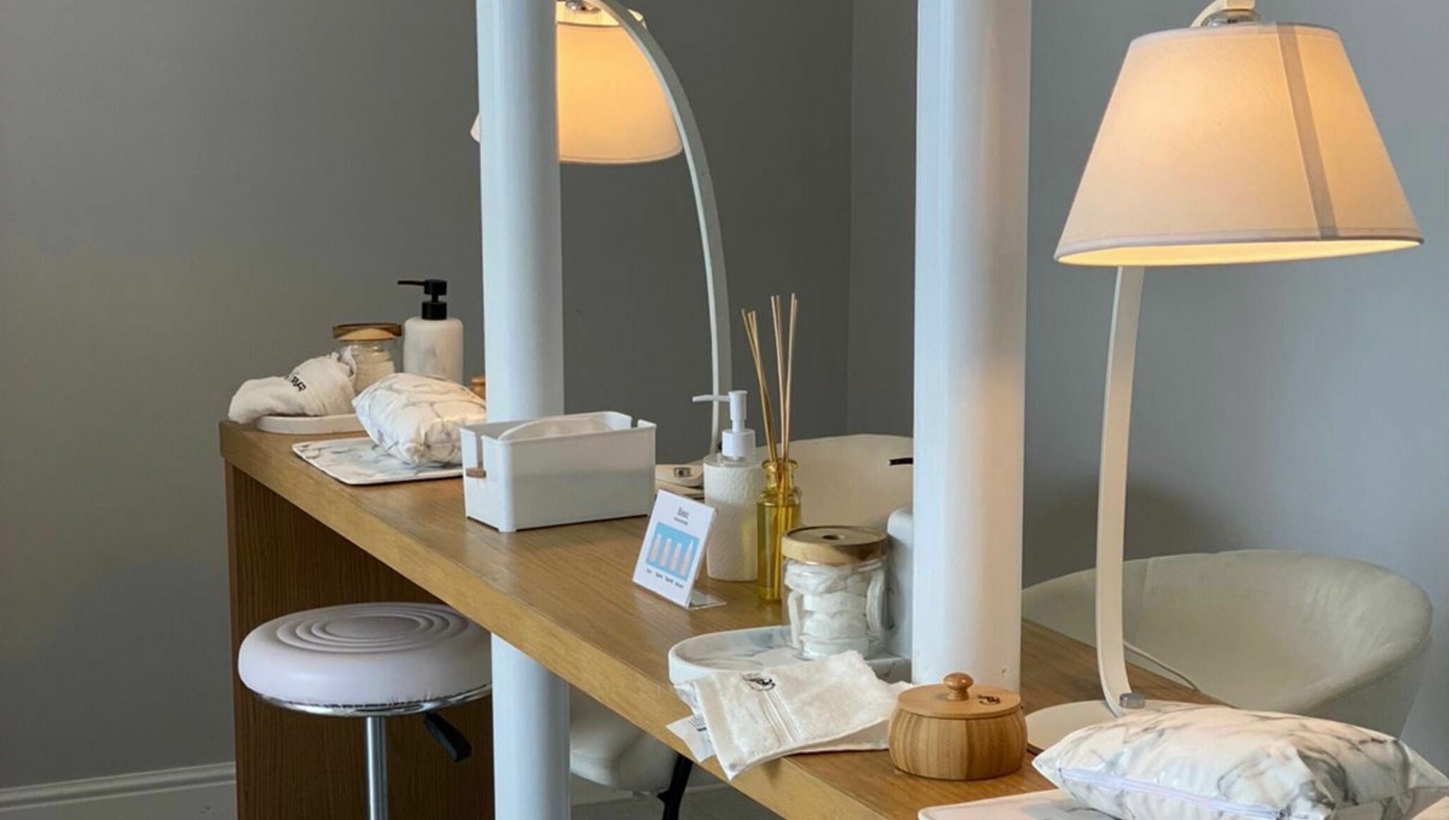 Elegant manicure setup at Grey Corner Salon, Al Mubarraz, Eastern Province, SA with cozy lighting.