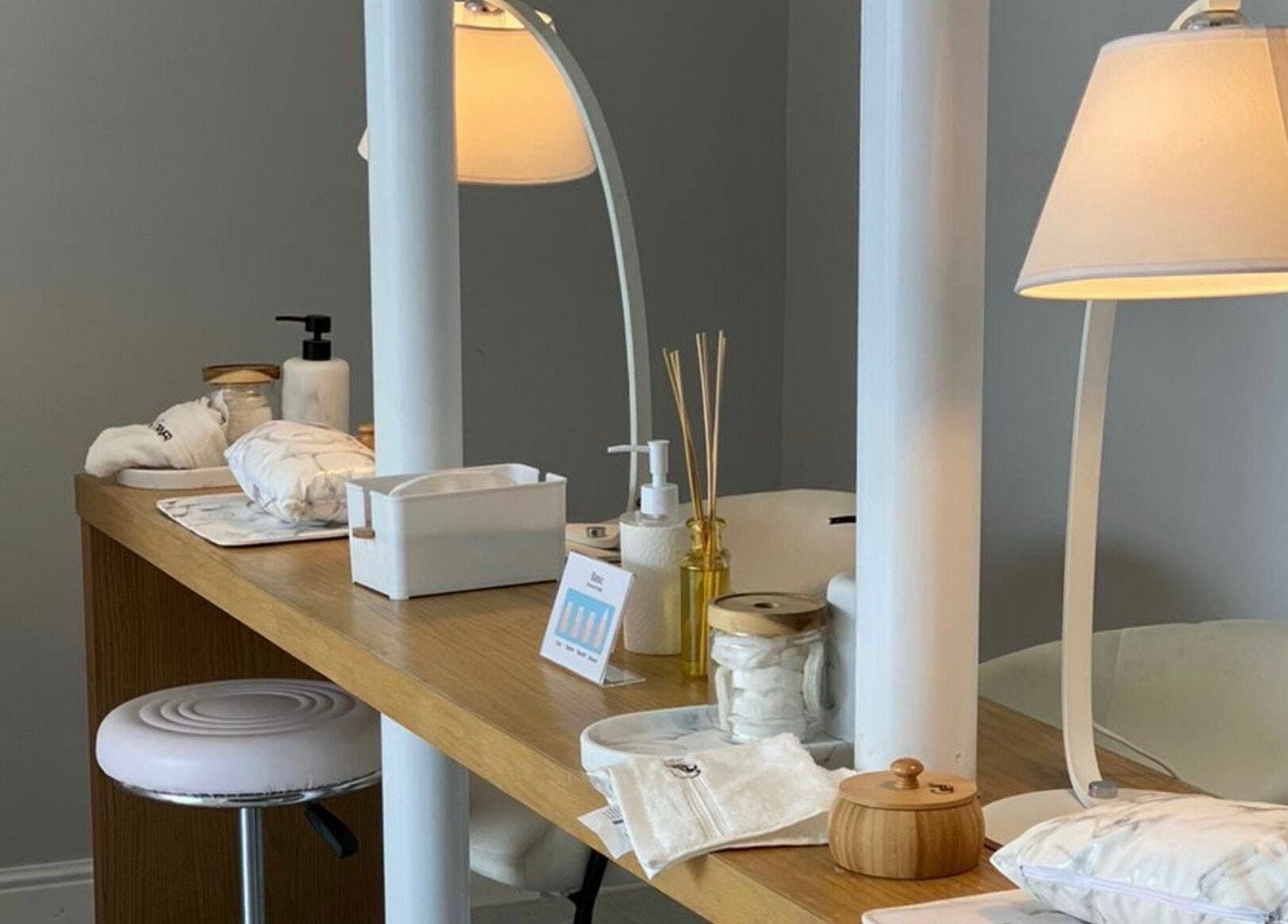 Elegant manicure setup at Grey Corner Salon, Al Mubarraz, Eastern Province, SA with cozy lighting.