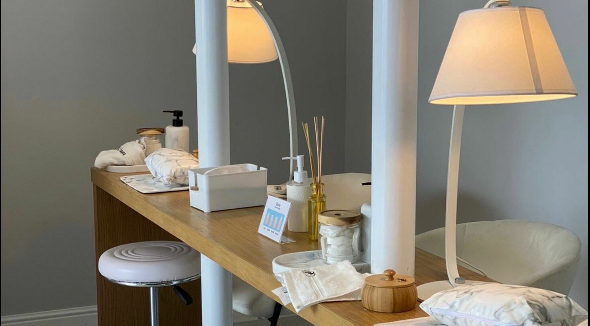 Elegant manicure setup at Grey Corner Salon, Al Mubarraz, Eastern Province, SA with cozy lighting.