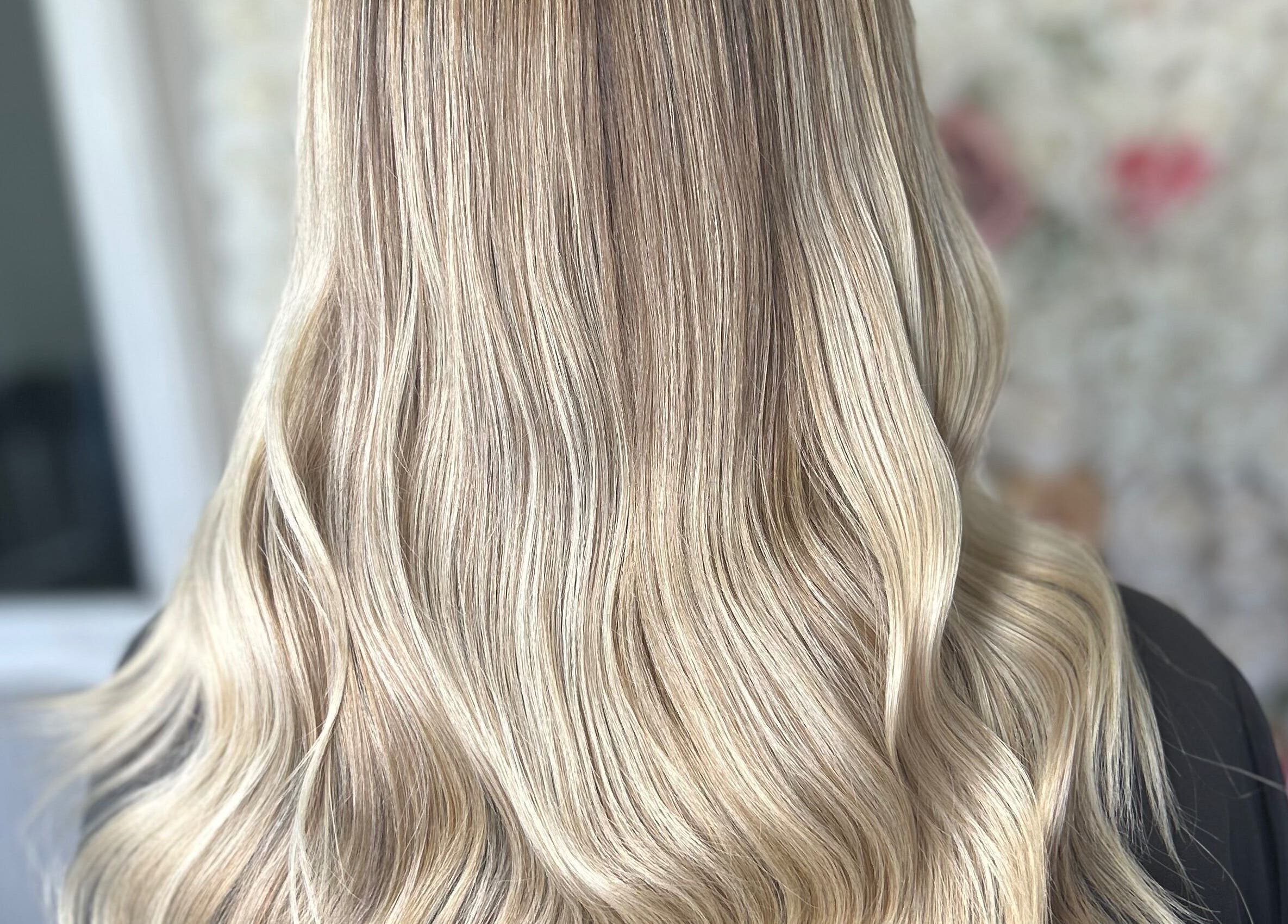 Beautiful blonde waves styled at Ksk Hair Academy in Lydney, England, GB.