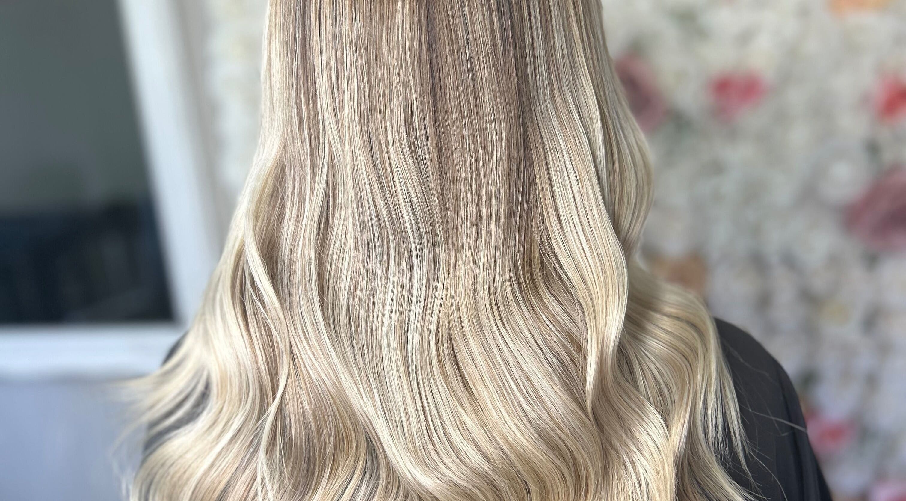 Beautiful blonde waves styled at Ksk Hair Academy in Lydney, England, GB.