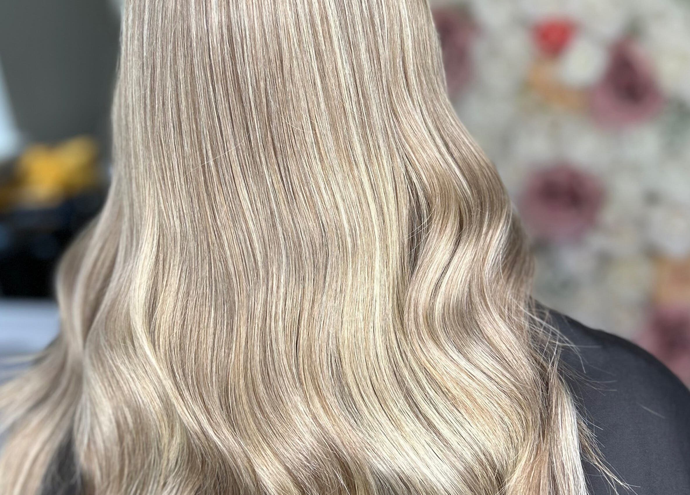 Elegant blonde waves styled at Ksk Hair Academy, Lydney, England, GB, showcasing expert hair design.