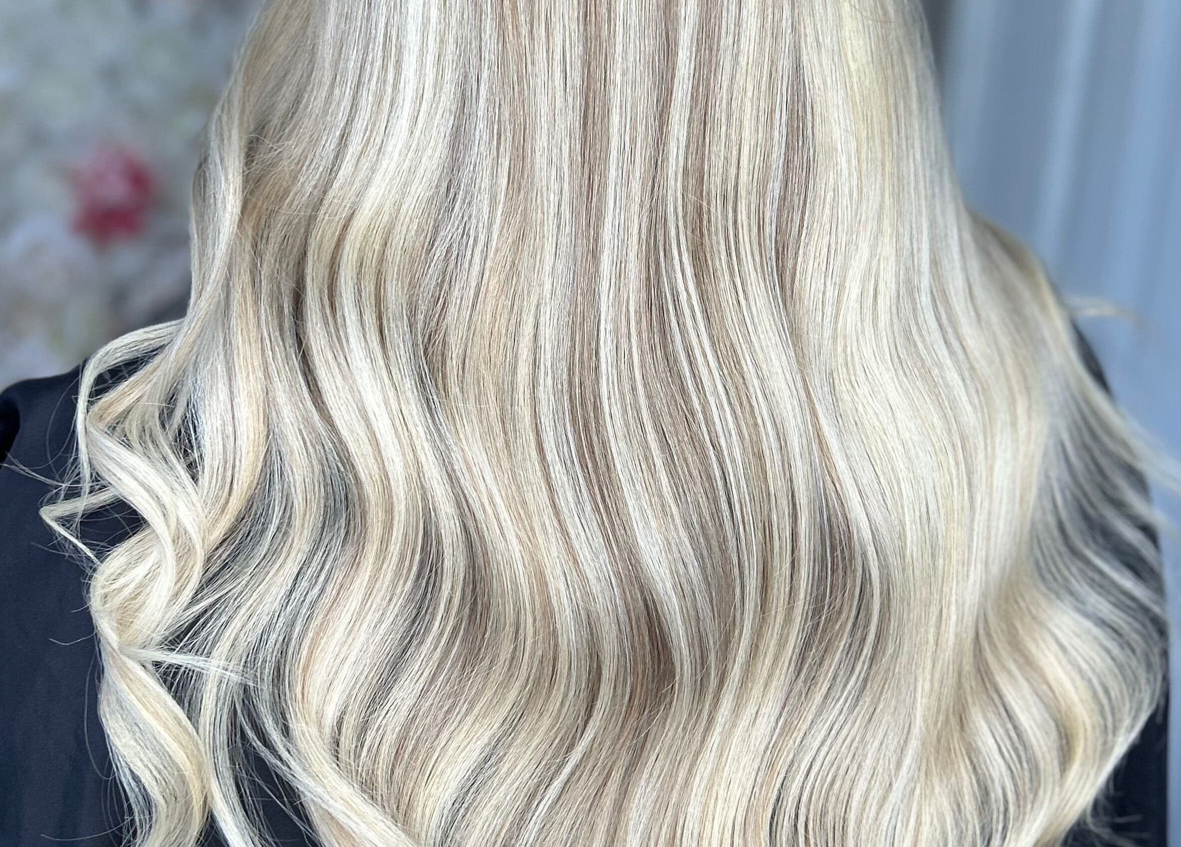 Blonde hair styled with waves at Ksk Hair Academy in Lydney, England, GB.