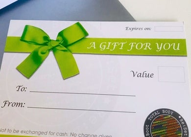 Elegant gift card with green ribbon from Pure Calma in Bournemouth, England, GB, perfect for wellness gifts.