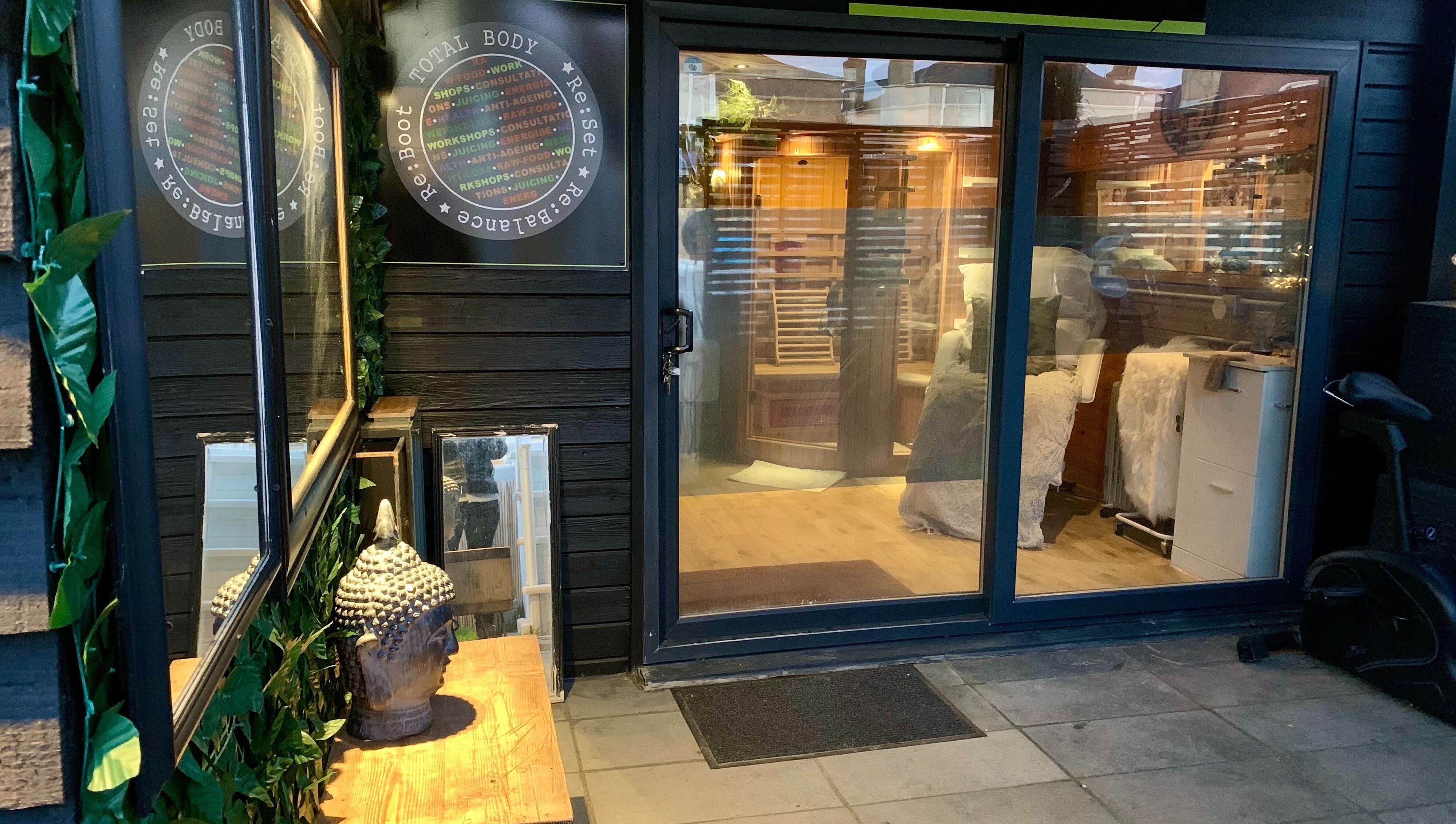 Welcoming entrance of Pure Calma Healing in Bournemouth, England, GB with peaceful and cozy ambiance.