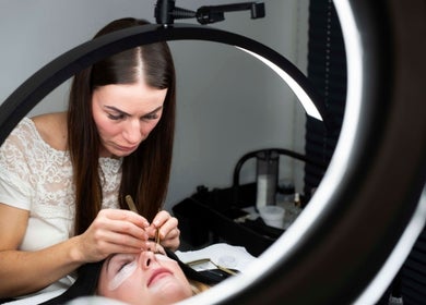 Expert eyelash extension application at Belle Beauty Studio & Academy, Gravesend, England, GB.