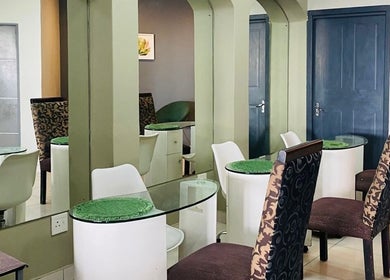 Elegant seating area at Orchard Day Spa @ North Beach Durban, featuring stylish decor in Durban, Kwazulu-natal, ZA.
