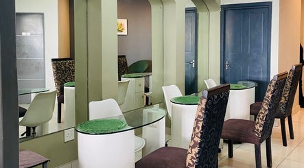 Elegant seating area at Orchard Day Spa @ North Beach Durban, featuring stylish decor in Durban, Kwazulu-natal, ZA.
