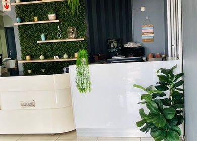Reception area of Orchard Day Spa @ North Beach Durban, featuring lush greenery. Located in Durban, Kwazulu-natal, ZA.