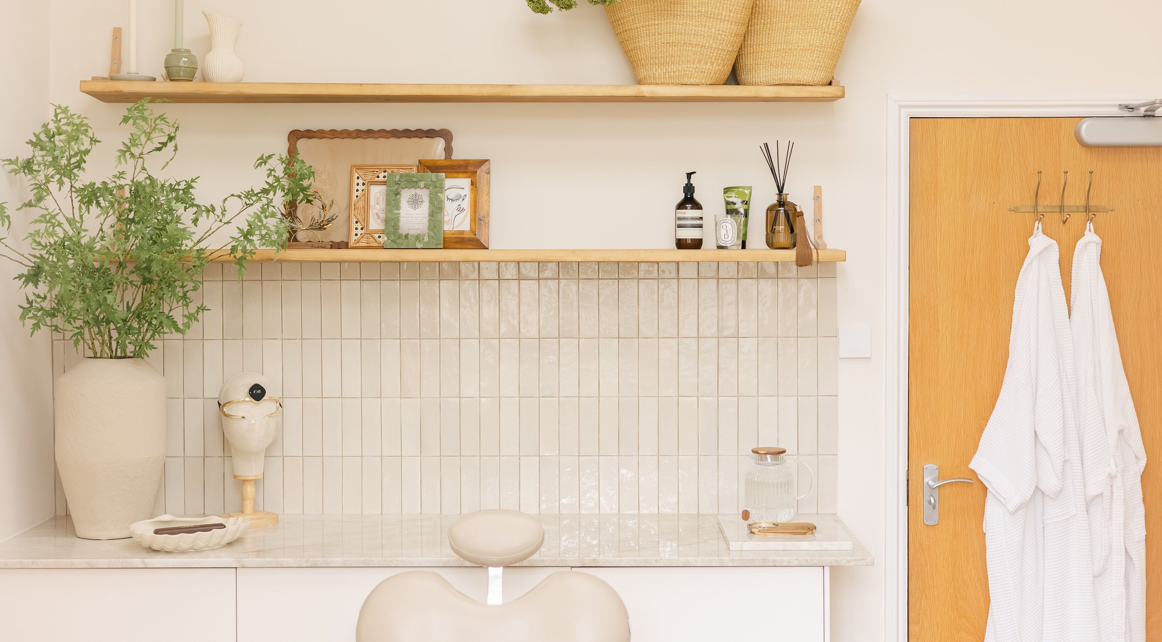 Elegant spa corner at Unfltrd Beauty, Waltham Abbey, England, GB, featuring soothing decor and greenery.