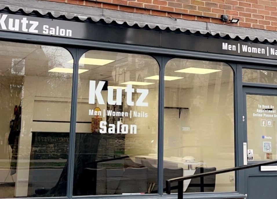 Front view of Kutz Salon, Lincoln, England, GB, showcasing modern window designs.