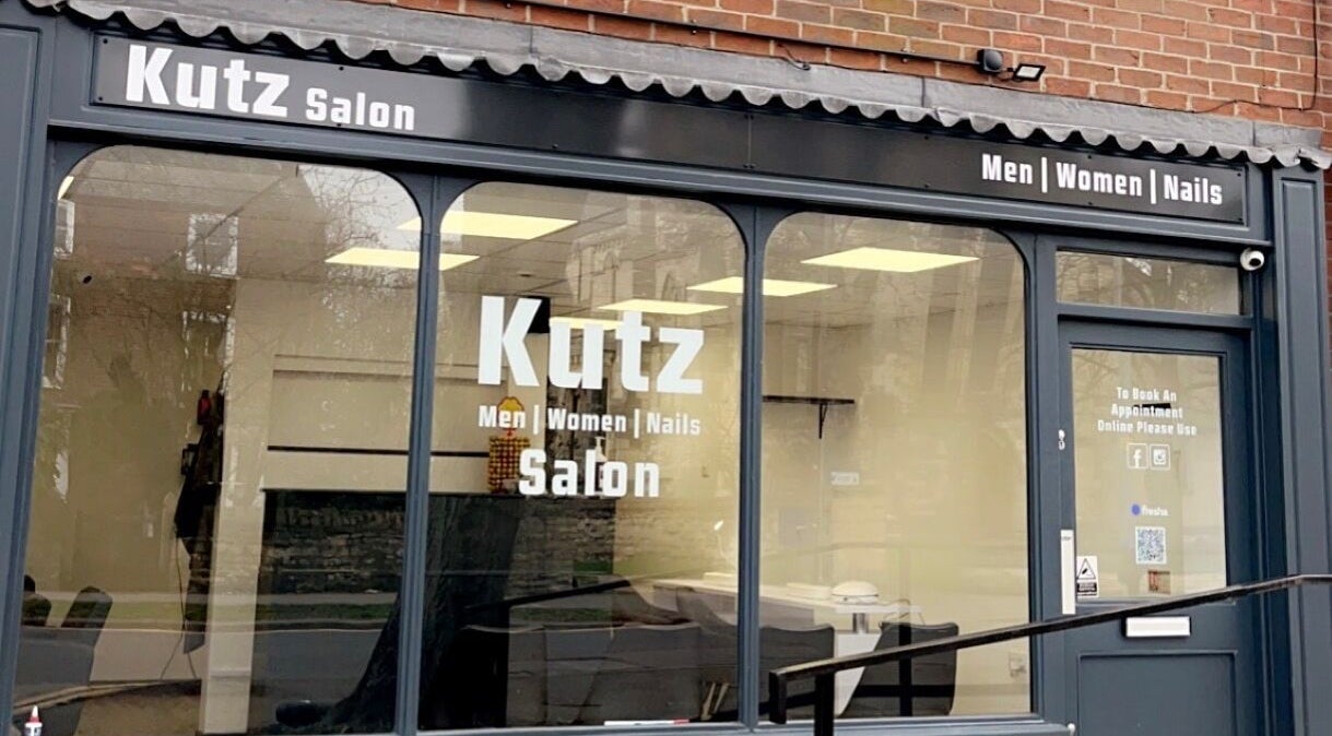 Front view of Kutz Salon, Lincoln, England, GB, showcasing modern window designs.