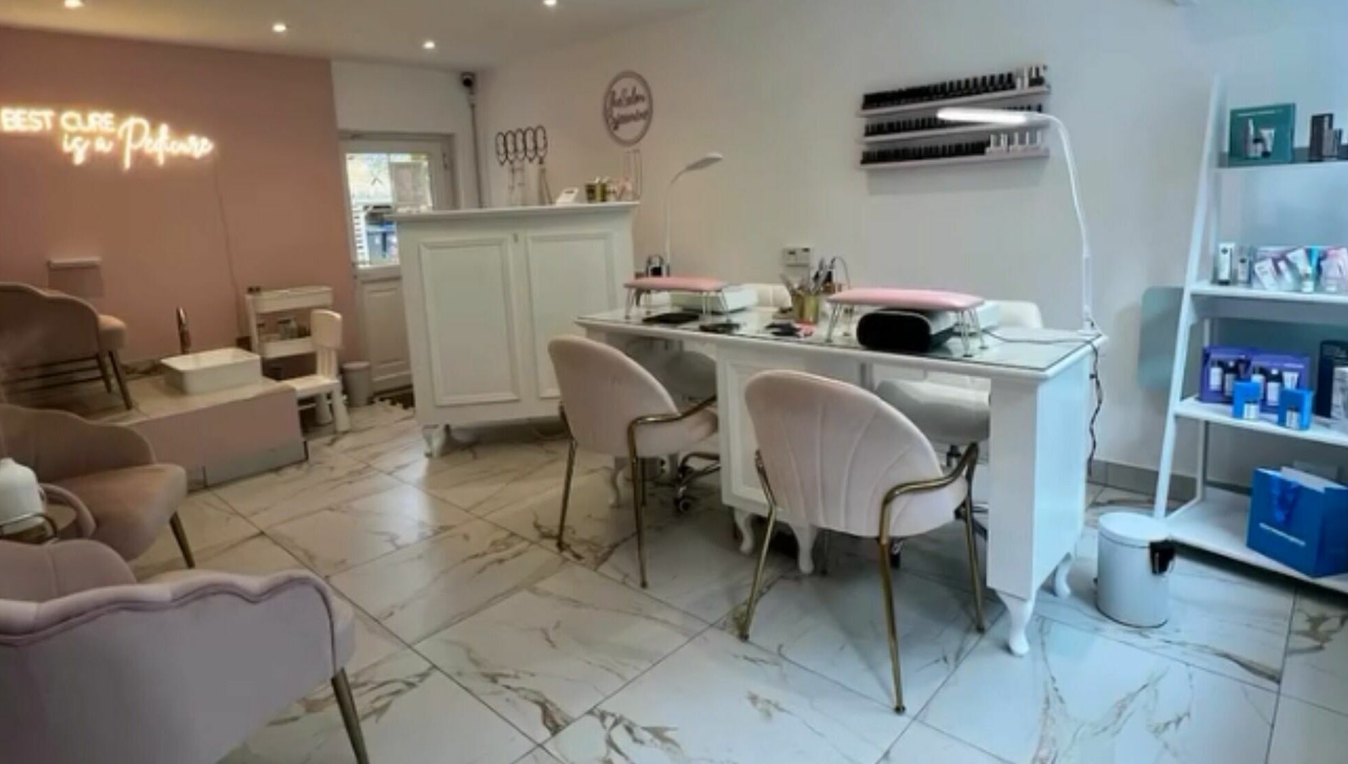 Elegant interior of The Salon by Jasmine featuring luxurious chairs and nail station in West Haddon, England, GB.