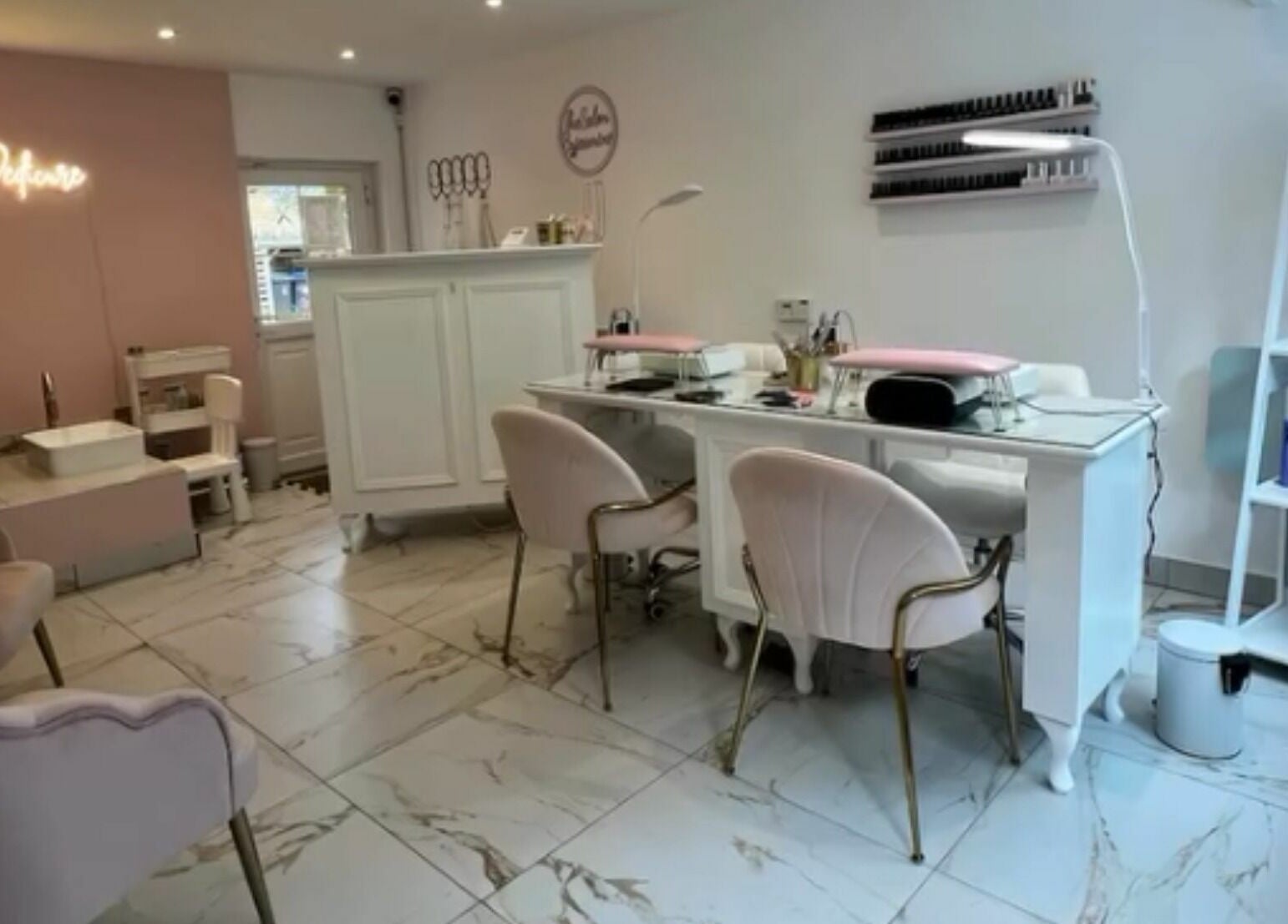 Elegant interior of The Salon by Jasmine featuring luxurious chairs and nail station in West Haddon, England, GB.