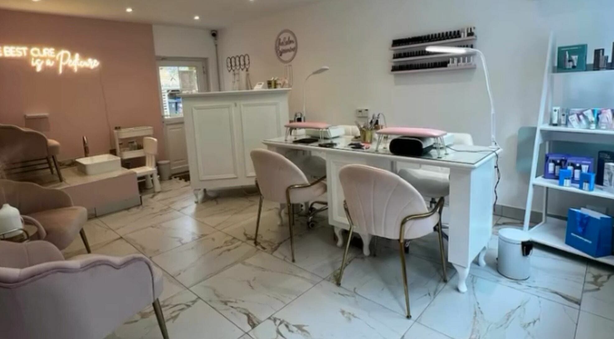 Elegant interior of The Salon by Jasmine featuring luxurious chairs and nail station in West Haddon, England, GB.