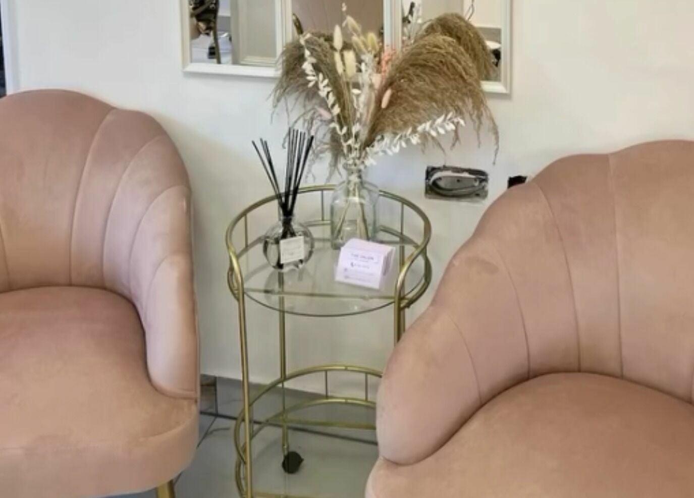 Elegant seating at The Salon by Jasmine in West Haddon, England, GB with chic decor and a stylish table.