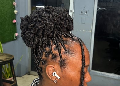 Intricate updo hairstyle at Millennial Beauty Tribe, Kingston, St. Andrew Parish, JM.
