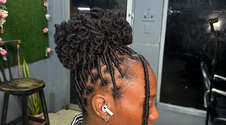 Intricate updo hairstyle at Millennial Beauty Tribe, Kingston, St. Andrew Parish, JM.