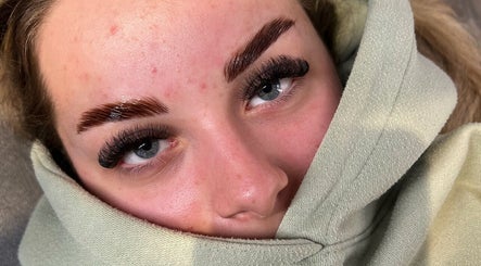 Close-up of styled eyebrows and lashes at Beauty by JM, Telford, England, GB, showcasing meticulous detailing.