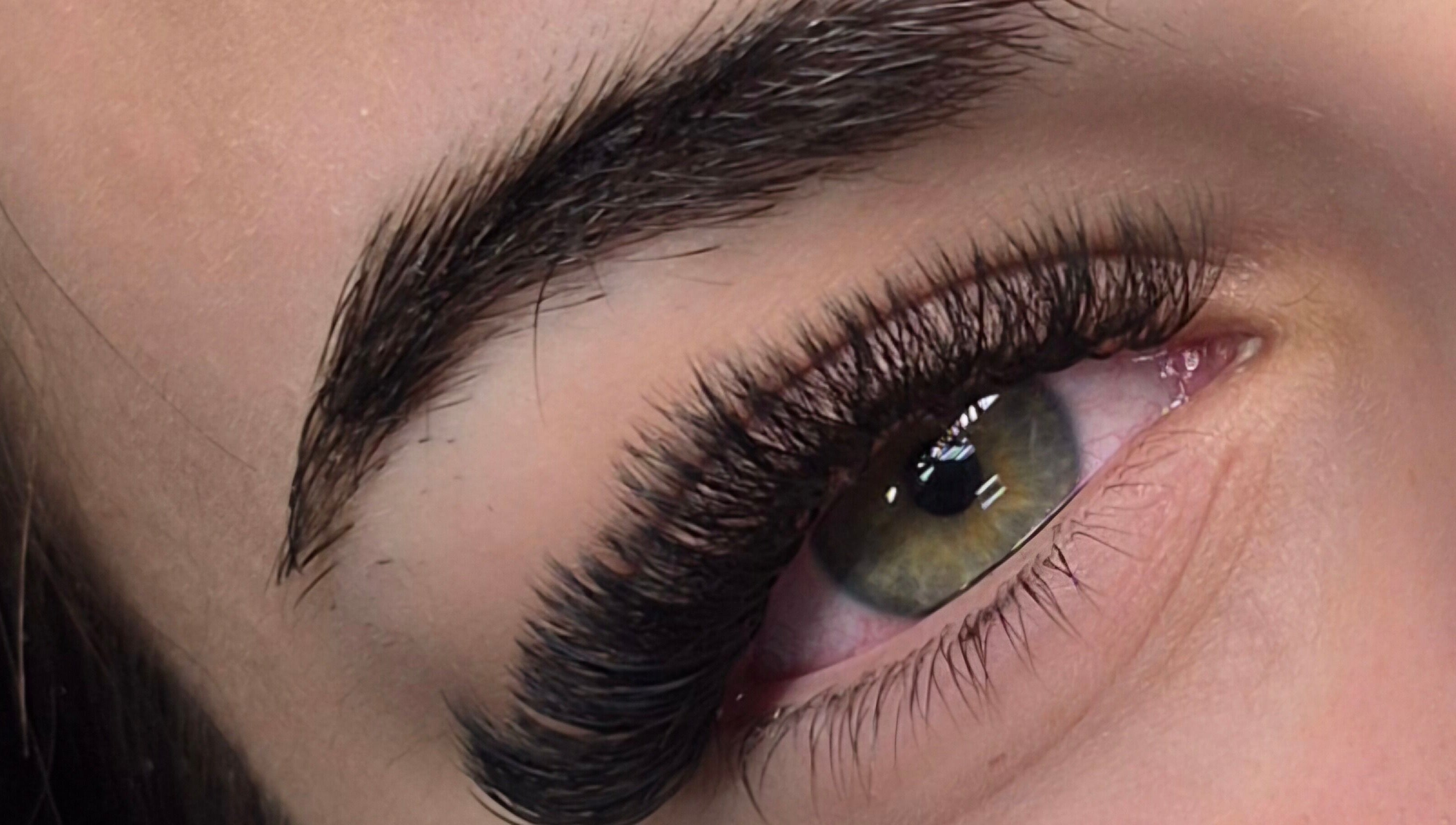 Close-up of enhanced eyelashes at E-Creations Beauty Salon, Jeffreys Bay, Eastern Cape, ZA.