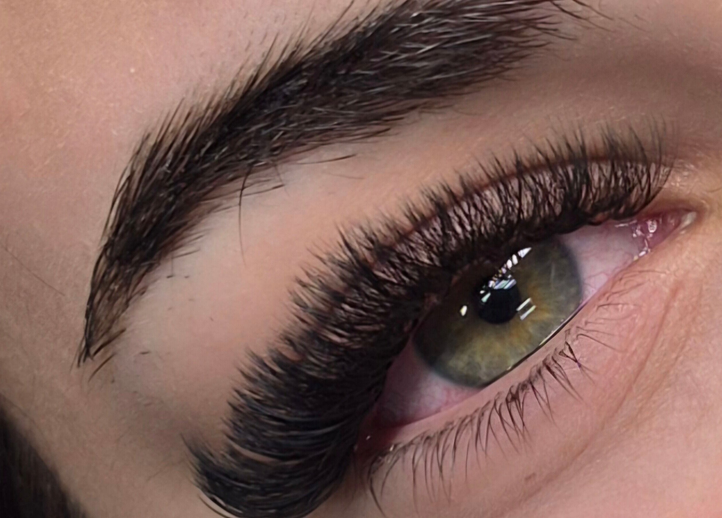 Close-up of enhanced eyelashes at E-Creations Beauty Salon, Jeffreys Bay, Eastern Cape, ZA.