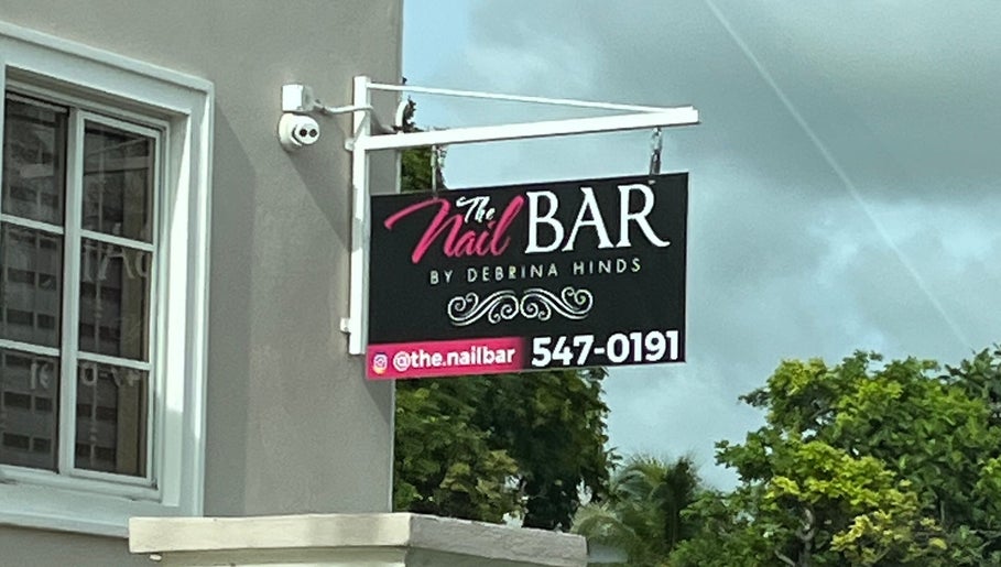 Chic sign for The Nail Bar offers a glimpse into Bellisima Touch & Spa's allure in Bridgetown, Saint Michael, BB.