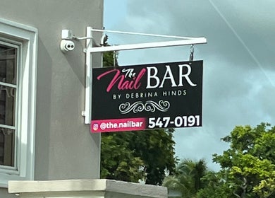 Chic sign for The Nail Bar offers a glimpse into Bellisima Touch & Spa's allure in Bridgetown, Saint Michael, BB.
