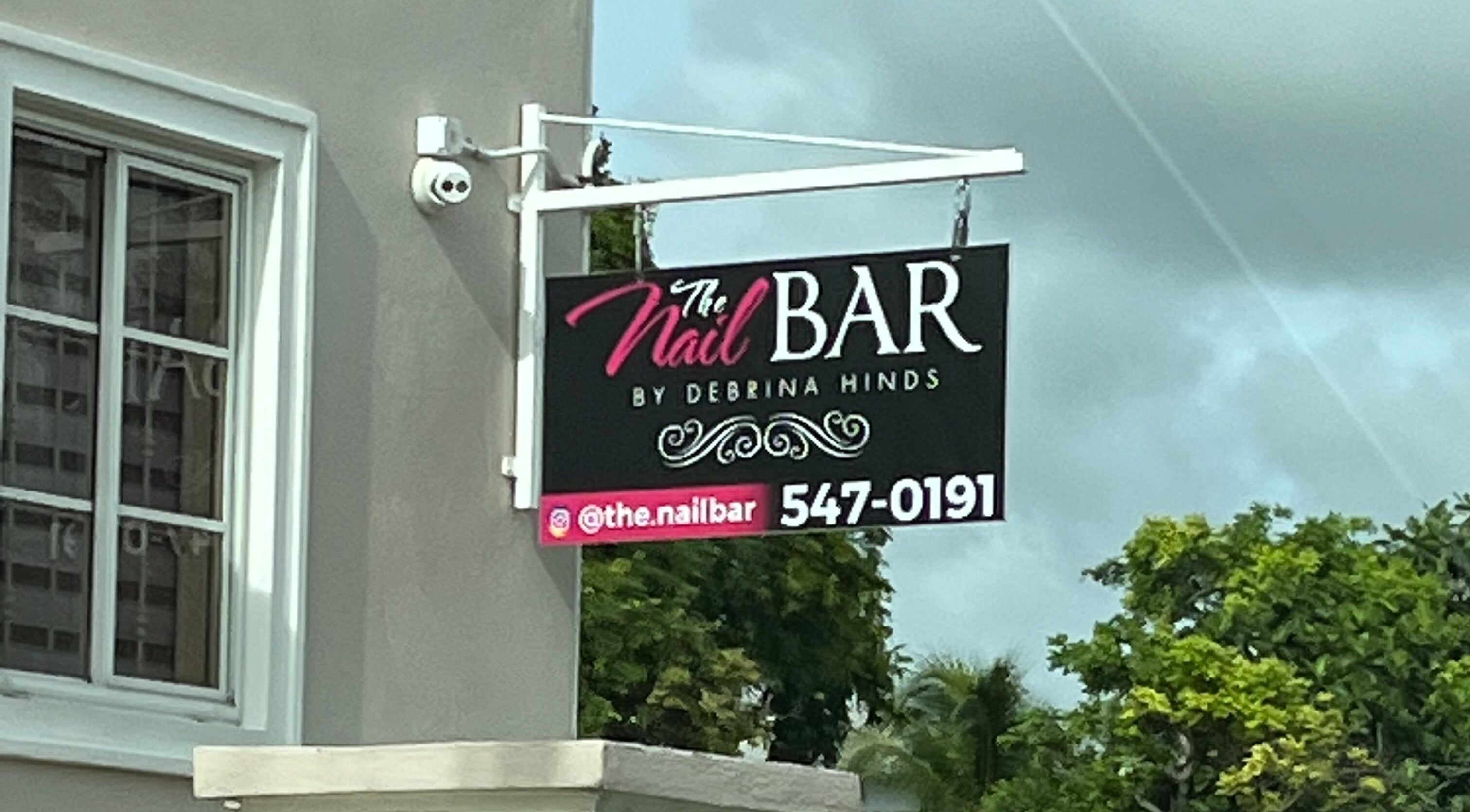 Chic sign for The Nail Bar offers a glimpse into Bellisima Touch & Spa's allure in Bridgetown, Saint Michael, BB.