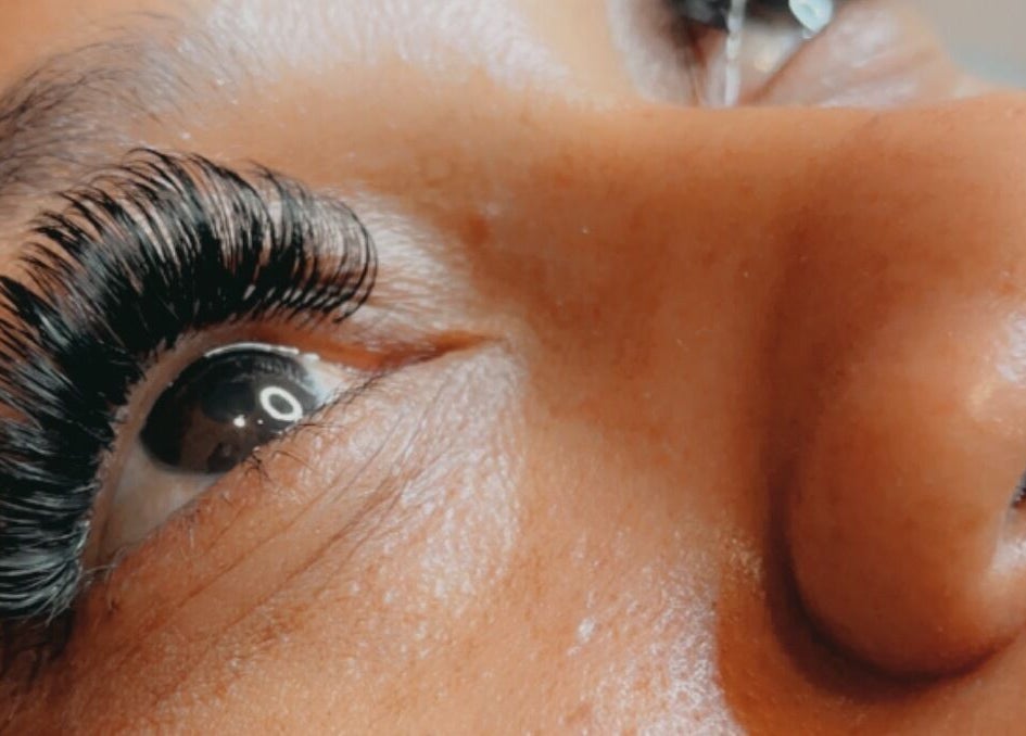 Close-up of lush eyelashes at Bellisima Touch & Spa in Bridgetown, Saint Michael, BB, showcasing expert beauty care.